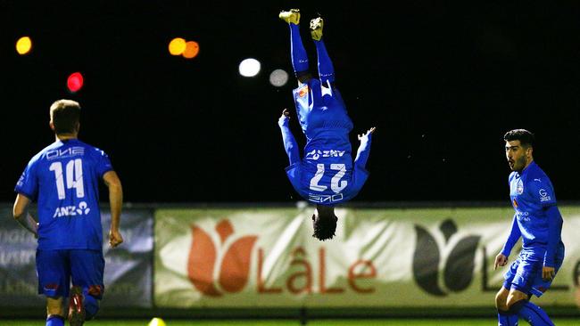 Elvis Kamsoba of Avondale celebrates his goal with some acrobatic brilliance.