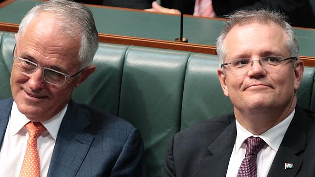 CANBERRA, AUSTRALIA - MAY 05:  Prime Minister Malcolm Turnbull and Treasurer Scott Morrison listen to Opposition leader Bill Shorten deliver his budget reply speech on May 5, 2016 in Canberra, Australia. The Turnbull Government's first budget has delivered tax cuts for small and medium businesses, income tax cuts people earning over $80,000 a year,new measures to help young Australians into jobs and cutbacks to superannuation concessions for the wealthy.  (Photo by Stefan Postles/Getty Images)