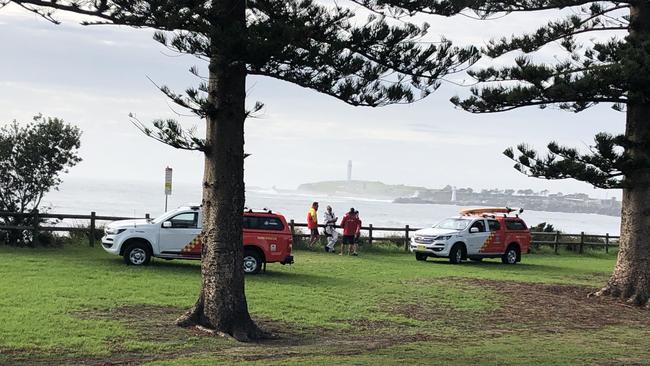 Police and Surf Lifesaving NSW crews at North Wollongong Beach on Tuesday morning.