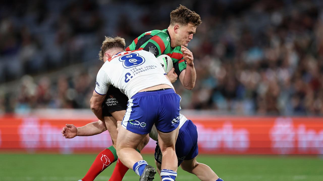 SYDNEY, AUSTRALIA - JULY 08: Liam Knight of the Rabbitohs is tackled during the round 19 NRL match between South Sydney Rabbitohs and Canterbury Bulldogs at Accor Stadium on July 08, 2023 in Sydney, Australia. (Photo by Cameron Spencer/Getty Images)