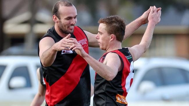 Josh Grabham and Tom Alkemade celebrate a Riddell goal. Picture: George Sal