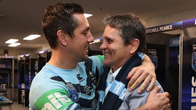 NSW's Mitchell Pearce celebrates victory in the room with his father Wayne Pearce after Game 3 of the State of Origin Series between NSW and QLD at ANZ Stadium, Homebush. Picture: Brett Costello