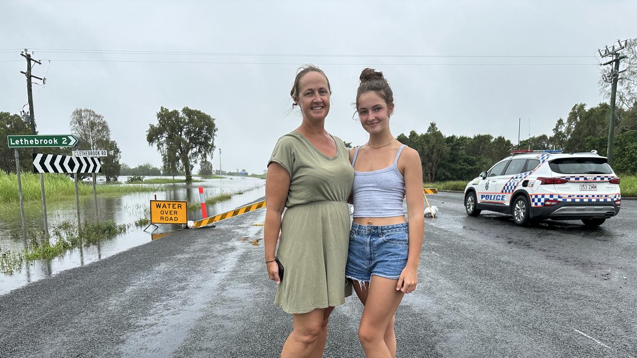 Proserpine mum Phillipa Leabeater and daughter Dash Turner, 13, were waiting for the floodwaters to subside over the Bruce Highway at Lethebrook, just south of Proserpine. They had been waiting since Sunday, January 15, 2023. Picture: Heidi Petith