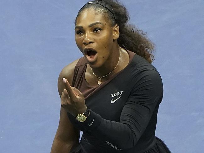 FILE - In this Saturday, Sept. 8, 2018, file photo, Serena Williams argues with the chair umpire during a match against Naomi Osaka, of Japan, during the women's finals of the U.S. Open tennis tournament at the USTA Billie Jean King National Tennis Center,  in New York. Some black women say Serena Williamsâ€™ experience at the U.S. Open final resonates with them. They say they are often forced to watch their tone and words in the workplace in ways that men and other women are not. Otherwise, they say, they risk being branded an "Angry Black Woman." (Photo by Greg Allen/Invision/AP, File)