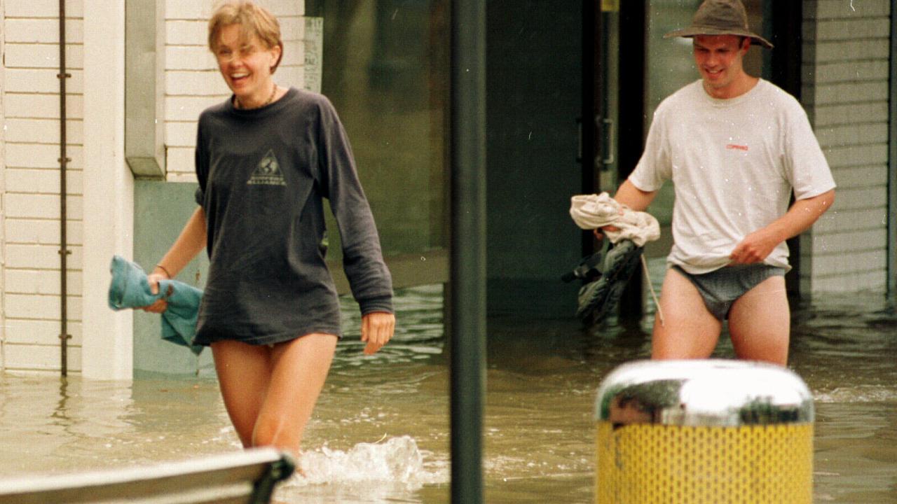 A new meaning to the term pedestrian strip in Gympie's flooded main street, February 9, 1999. Photo: Grainger/Laffan