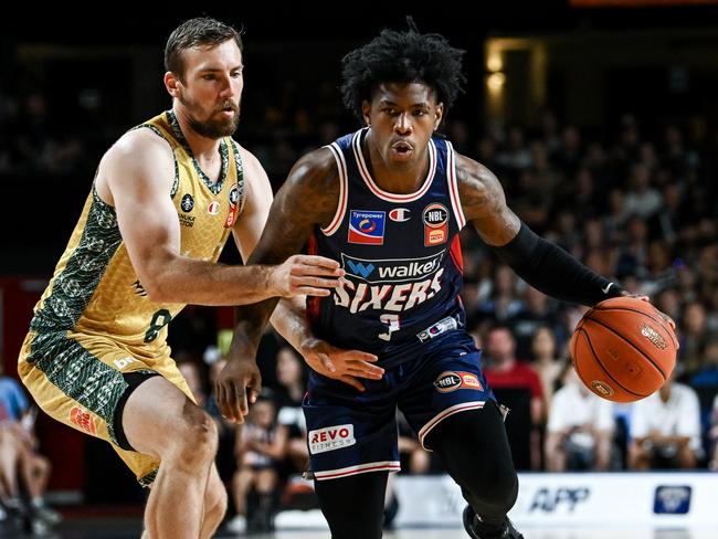 ADELAIDE, AUSTRALIA - JANUARY 26: Kendric Davis of the 36ers  competes with  Mitch McCarron of the Breakers during the round 18 NBL match between Adelaide 36ers and New Zealand Breakers at Adelaide Entertainment Centre, on January 26, 2025, in Adelaide, Australia. (Photo by Mark Brake/Getty Images)