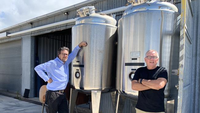 Russell Gee and Victor Nicholls of Rusty's Brewing Company with fermenters which may feature in their Sandgate microbrewery. Picture: Michelle Smith