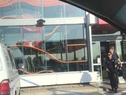 Police investigate a McDonald's robbed by the bandits. Source: Victoria Police Facebook