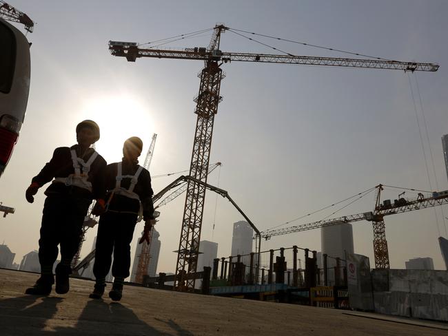 Construction has slowed dramatically in China, weakening demand for iron ore from our biggest export market. Picture: AP