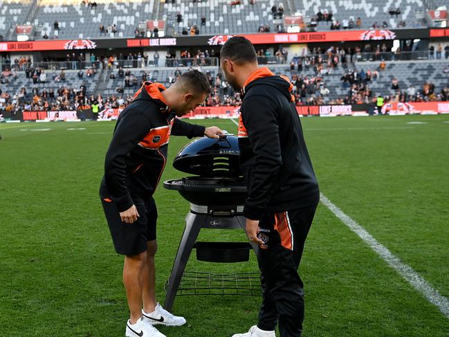 Luke Brooks was farewelled with the parting gift of a BBQ by the Tigers. Pic: NRL Photos