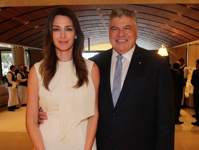 Aussie Home Loans founder John Symond (R) and wife Amber (L) during their annual Christmas cocktail party of at their home in Point Piper, Sydney, Australia, 15 December 2016. Photo by Brianne Makin