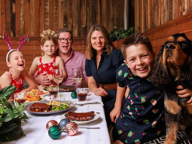 Daily Telegraph. 13, November, 2023.Christmas Pubs with Pets. Michael and Rachel Worden, with Lois, 9, Scarlett, 6, and Oscar, 9, with Duke, at The Gymea Hotel (Christmas day lunches are selling out for pet friendly families are booking in a meal on Christmas Eve).Picture: Justin Lloyd.