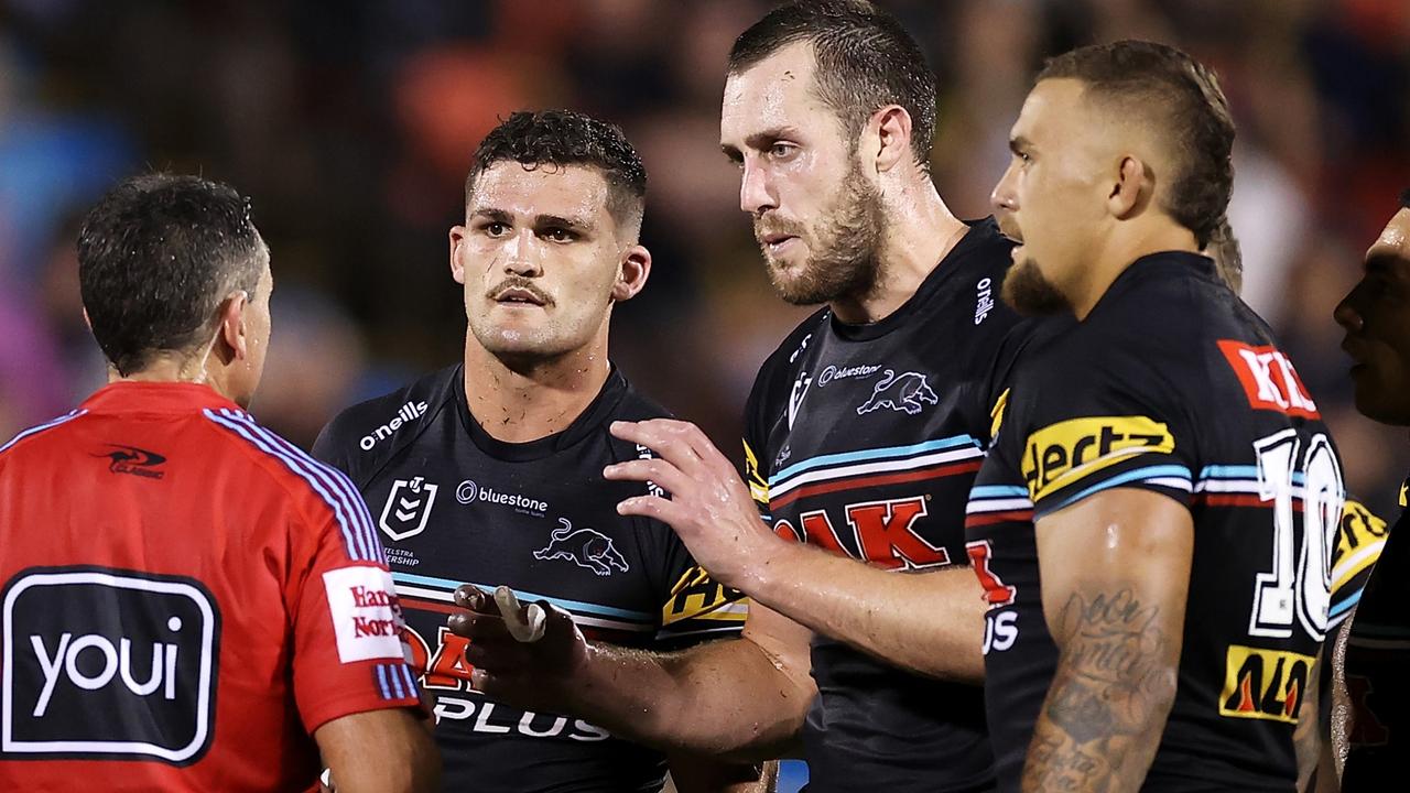 PENRITH, AUSTRALIA - MARCH 03: Nathan Cleary and Isaah Yeo of the Panthers speak to referee Gerard Sutton during the round NRL match between the Penrith Panthers and the Brisbane Broncos at BlueBet Stadium on March 03, 2023 in Penrith, Australia. (Photo by Mark Kolbe/Getty Images)