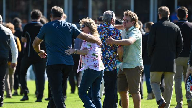 Antonio’s father embraces his son’s friends. Picture: NCA NewsWire / Naomi Jellicoe