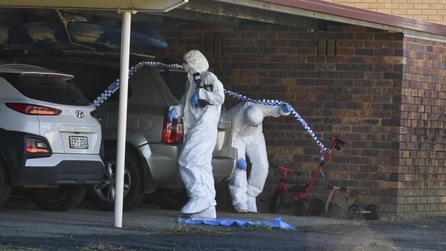 Richmond police officers canvassing the scene along with multiple forensic police teams after the shocking discovery of a dead father and son in Lismore in May 2024.