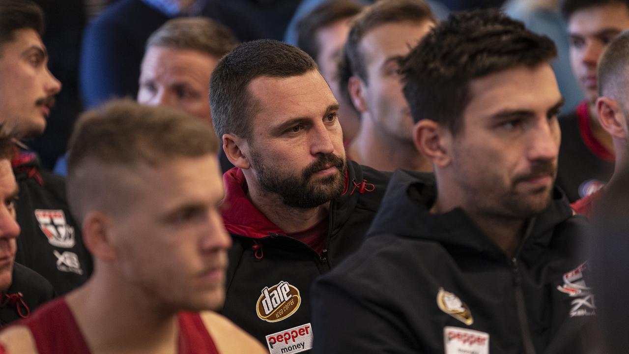 Saints captain Jarryn Geary and teammates look on. (AAP Image/Daniel Pockett)