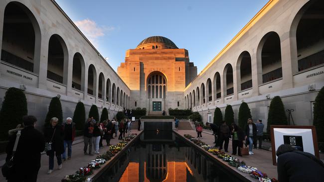 The public attend the Last Post ceremony at the Australian War Memorial in Canberra on Anzac Day. Picture: Gary Ramage