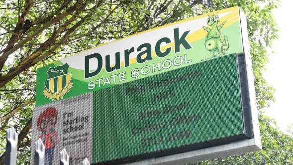 A mother has claimed to have seen three women attacking each other in the carpark of Durack State School on Tuesday afternoon during school pickup.