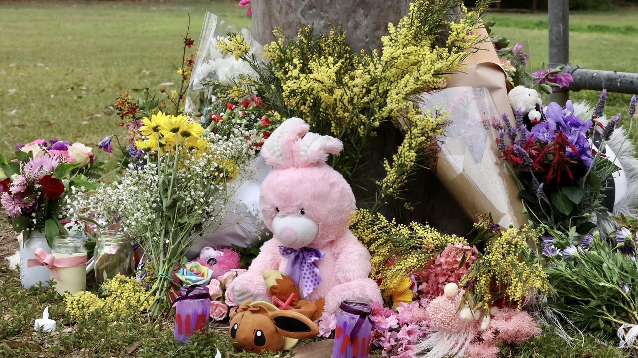 Flowers and toys at the memorial for Mia at Glindemann Park, Holland Park. Picture: Liam Kidston.