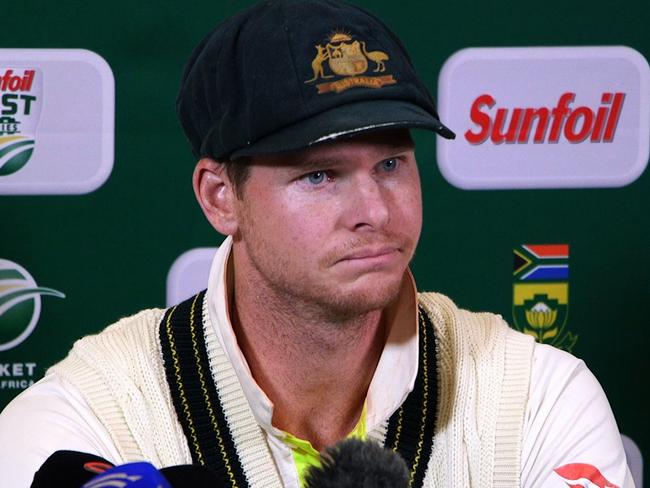 TOPSHOT - This video grab taken from a footage released by AFP TV shows Australia's captain Steve Smith speaking during a press conference in Cape Town, on March 24, 2018 as he admitted to ball-tampering during the third Test against South Africa. Australia captain Steve Smith and team-mate Cameron Bancroft sensationally admitted to ball-tampering during the third Test against South Africa on March 24, 2018, plunging cricket into potentially its greatest crisis. Bancroft was caught on television cameras appearing to rub a yellow object on the ball, and later said: "I was in the wrong place at the wrong time. I want to be here (in the press conference) because I want to be accountable for my actions." / AFP PHOTO / AFP TV / STR