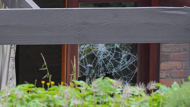 Smashed windows at the property. Picture: Jason Edwards