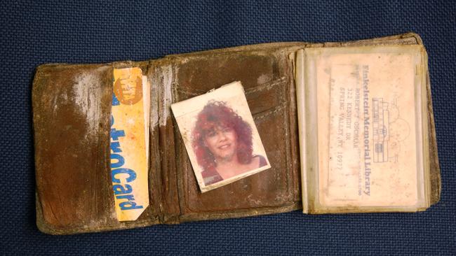 The wallet Robert J Gschaar was carrying when he was killed at the World Trade Center. The photo in the center is of his wife Myrta Gschaar, who gave the wallet to the National September 11 Memorial and Museum at the World Trade Center.