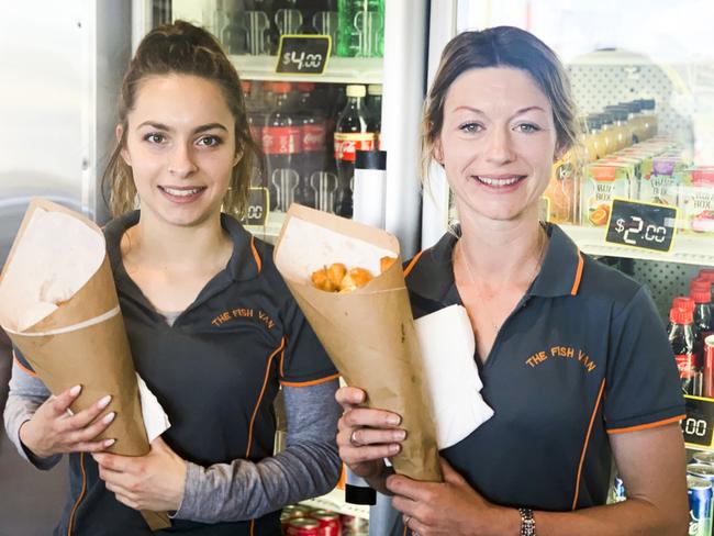 Chloe Todd and Lauren Pennicott with a tasty feed at The Fish Van in Triabunna.