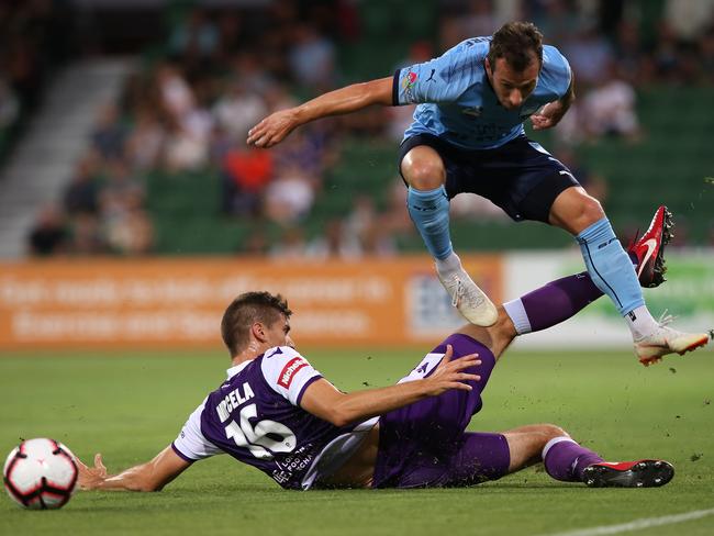 PERTH, AUSTRALIA - JANUARY 09: Tomislav Mrcela of the Glory tackles Adam Le Fondre of Sydney during the round 12 A-League match between the Perth Glory and Sydney FC at HBF Park on January 09, 2019 in Perth, Australia. (Photo by Paul Kane/Getty Images)