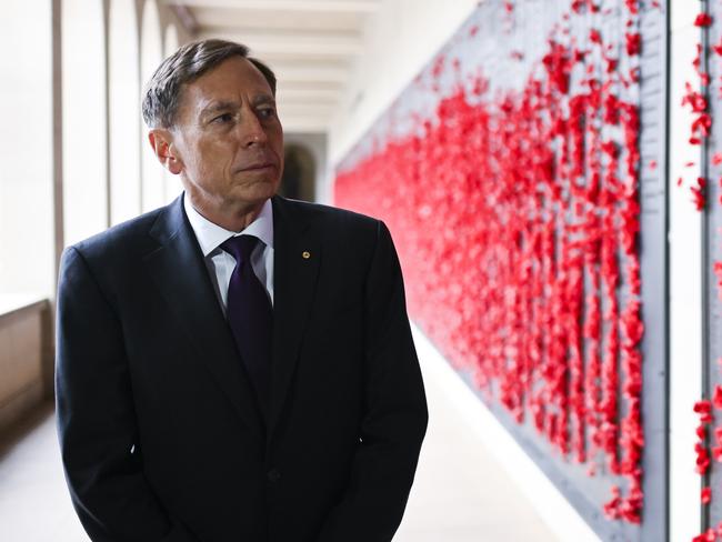 United States General (Retd) David H. Petraeus is seen as he inspects the Roll of Honour during a visit to the Australian War Memorial in Canberra, Tuesday, August 13, 2019. (AAP Image/Lukas Coch) NO ARCHIVING