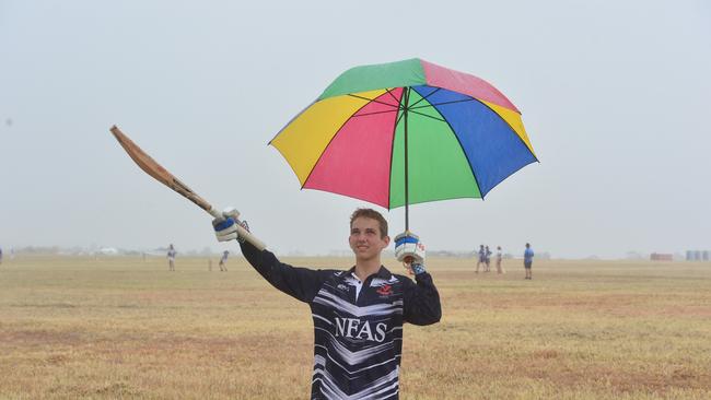 Jake Barwick, from Townsville, didn't let rain stop him playing for the Norths’ father and son team in a previous Goldfields Ashes. Picture: Evan Morgan