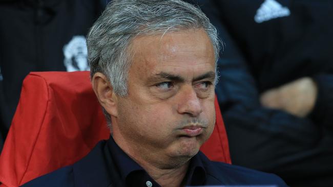 TOPSHOT - Manchester United's Portuguese manager Jose Mourinho reacts ahead of the Champions League group H football match between Manchester United and Valencia at Old Trafford in Manchester, north west England, on October 2, 2018. (Photo by Lindsey PARNABY / AFP)