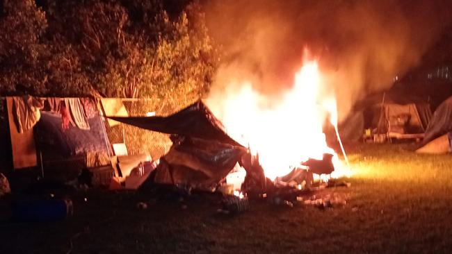 A tent on fire at Musgrave Park. Photo: Supplied