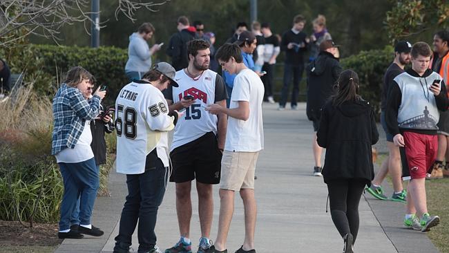 Residents head out to Park Central yesterday to catch Pokemon. Picture: Robert Pozo