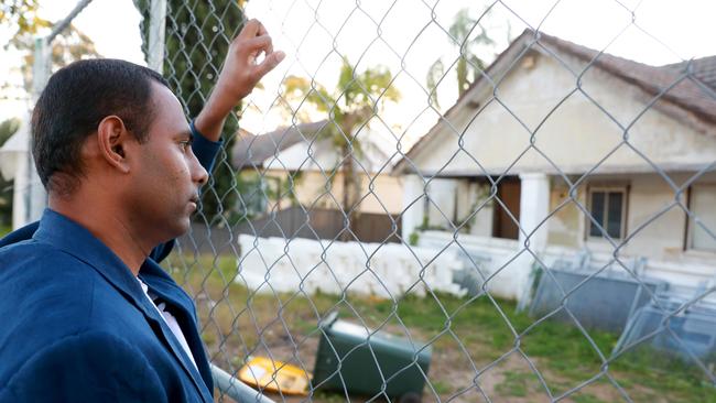 Satya Maddi stands in front of the site for the proposed boarding house on Oramzi Rd in Girraween in July. Picture: Angelo Velardo