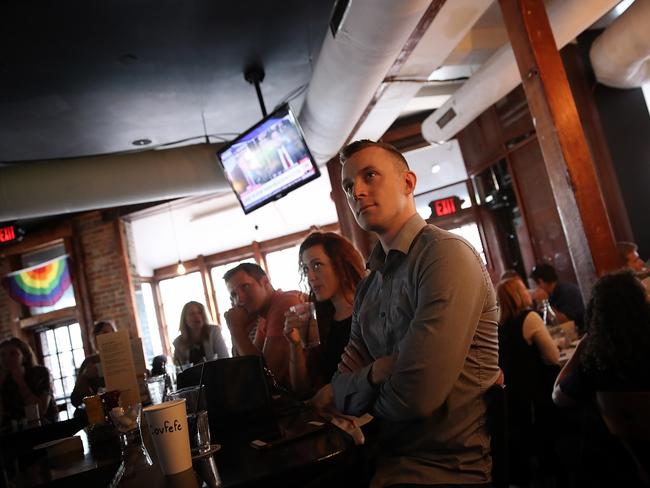 Patrons watch James Comey’s testimony at a bar in Washington DC. Picture: Win McNamee/Getty Images/AFP