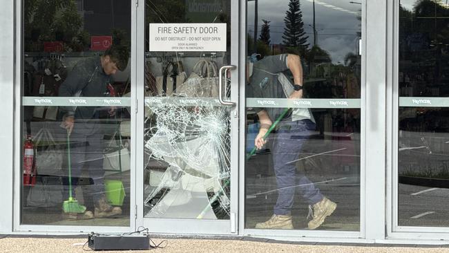 Seven shopfronts were found smashed up at Domain Central in Townsville on Friday morning. Picture: Natasha Emeck