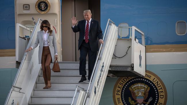 President Donald Trump and first lady, Melania Trump arrive aboard Air Force One at Helsinki International Airport.