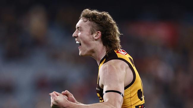 MELBOURNE, AUSTRALIA - MAY 13: Josh Weddle of the Hawks celebrates a goal  during the round nine AFL match between Hawthorn Hawks and Melbourne Demons at Melbourne Cricket Ground, on May 13, 2023, in Melbourne, Australia. (Photo by Darrian Traynor/AFL Photos/via Getty Images )