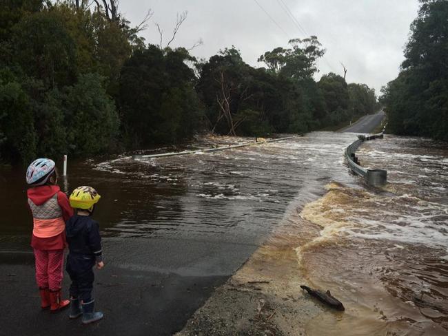 A flooded road at Bakers Beach in the state’s North. Picture: BEN WILD