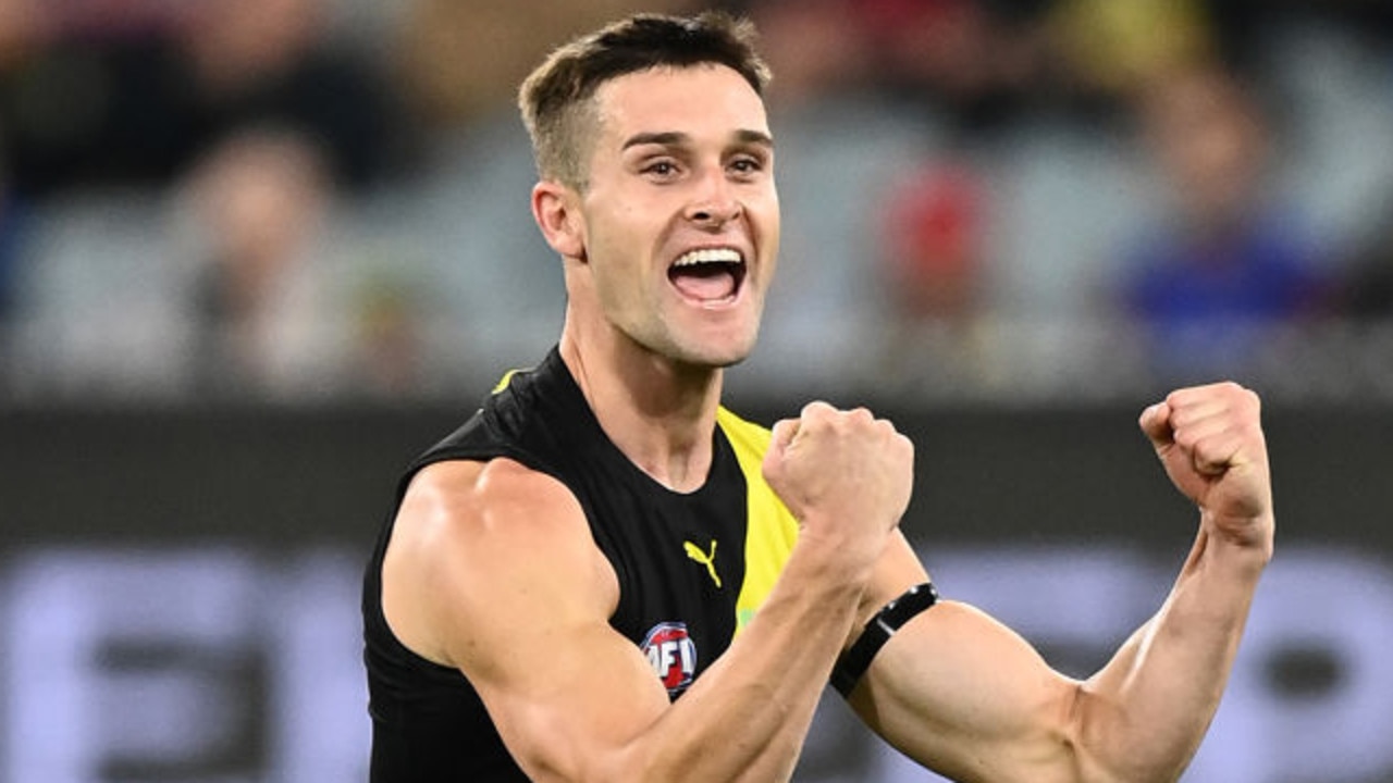 MELBOURNE, AUSTRALIA - APRIL 09: Jayden Short of the Tigers celebrates kicking a goal during the round four AFL match between the Richmond Tigers and the Western Bulldogs at Melbourne Cricket Ground on April 09, 2022 in Melbourne, Australia. (Photo by Quinn Rooney/Getty Images)