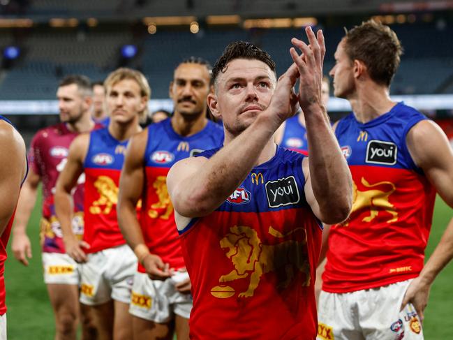 MELBOURNE, AUSTRALIA - JUNE 07: Lachie Neale of the Lions celebrates as he leads the team off the field during the 2024 AFL Round 13 match between the Western Bulldogs and the Brisbane Lions at Marvel Stadium on June 07, 2024 in Melbourne, Australia. (Photo by Dylan Burns/AFL Photos via Getty Images)