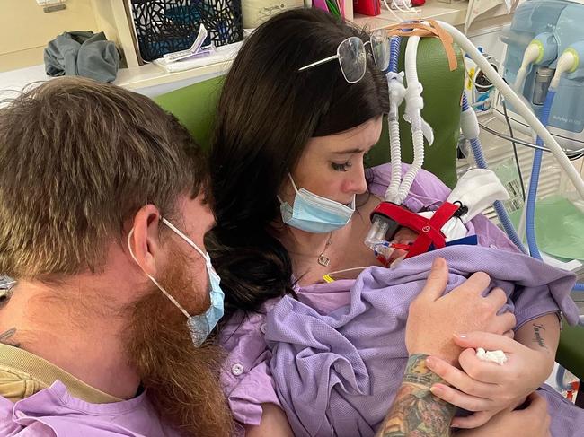 Coco-Cherie Boyd, pictured with partner Shannon Sutherland in Royal Brisbane and Women’s Hospital believes she and baby Willow are lucky to be alive.