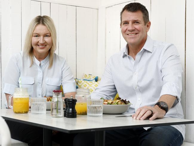 Journalist Linda Silmanis with former NSW premier Mike Baird. Picture: Richard Dobson