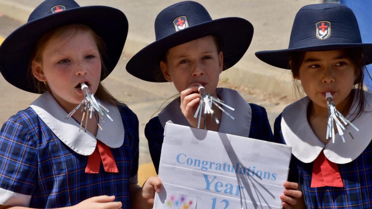 Suncoast Christian College farewells Year 12 students with a guard of honour across the campus.