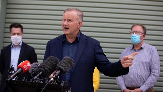 "We need to do it once, and do it right," Labor leader Anthony Albanese said after announcing $25 for a new Emergency Operations Precinct in Moruya. Outside Moruya RFS Hall with NSW Labor leader Chris Minns, left, and Labor candidate for Bega, Michael Holland, right, January 27, 2022. Photo: Nathan Schmidt