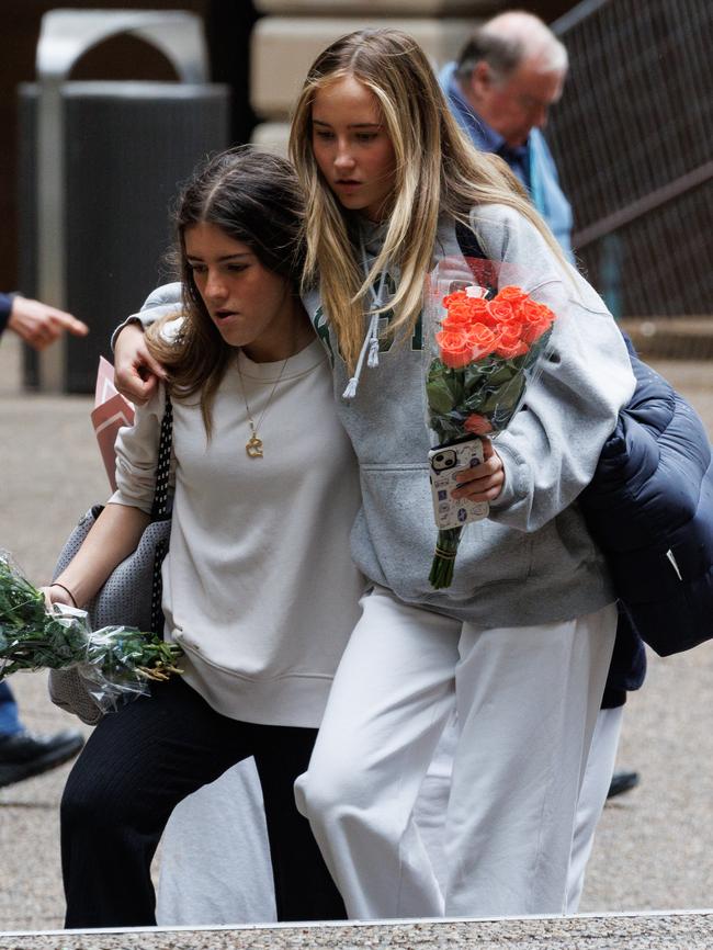 Children laid floral tributes Lilie James at the school. Picture: David Swift.