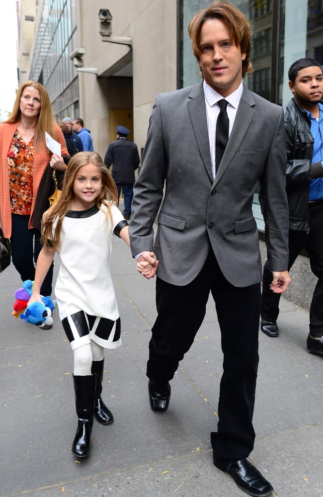 A then-child Dannielynn, who was just five months old when her mother died, pictured with her father. Picture by: Steffman-Harding/Splash News