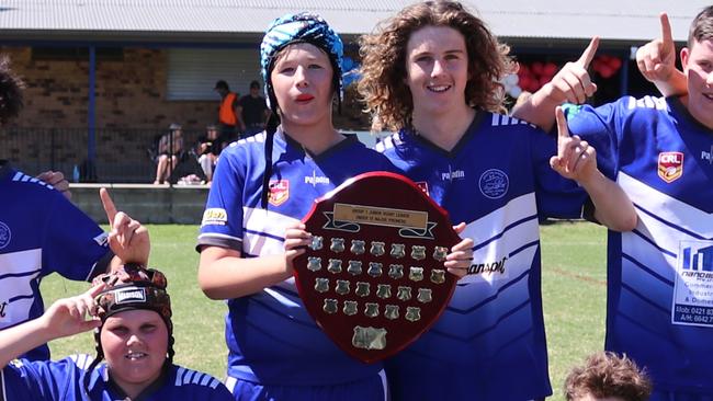 Grafton Ghosts under-13 celebrate a Group 1 Junior Rugby League grand final victory after a 32-22 win over the Ballina Seagulls. Photo: Amy Hodge