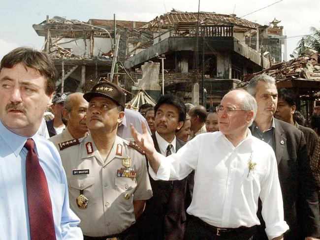 Former Prime Minister John Howard, second from right, at the site of the October 12, 2002, bombing in Kuta. Picture: AFP