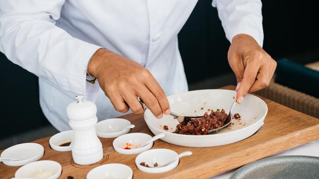 The steak tartare is prepared tableside at Bondi Icebergs.